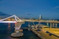 Port Vell with its cruise terminal, bridge Porta d`Europa and W Barcelona at night