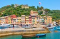 Port and waterfront with walking people in Portofino