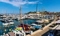 Port and yacht marina at Saint-Jean-Cap-Ferrat resort town on Cap Ferrat cape at French Riviera of Mediterranean Sea in France Royalty Free Stock Photo