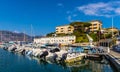 Port and yacht marina at Saint-Jean-Cap-Ferrat resort town on Cap Ferrat cape at French Riviera of Mediterranean Sea in France Royalty Free Stock Photo