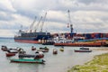 Port of Zanzibar with big ships, cranes and cargos near the quay in Stone Town, Zanzibar, Tanzania Royalty Free Stock Photo