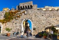 Porta Catania gate of ancient stone city walls of historic old town of Taormina in Messina region of Sicily in Italy Royalty Free Stock Photo