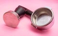 porta filter and tamper barista equipment on pink background Royalty Free Stock Photo