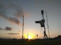 Portable Automatic Weather Station at Ngurah Rai airport under the beautiful altocumulus clouds. This tool has a function to Royalty Free Stock Photo