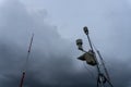 Portable Automatic Weather Station at Ngurah Rai airport under the scary dark Cumulonimbus clouds. This tool has a function to Royalty Free Stock Photo