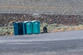 Portable bathrooms lined up at a parking lot in southeastern Washington, USA