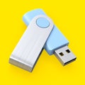 Portable blue USB flash drive stick for workspace isolated on yellow background Royalty Free Stock Photo