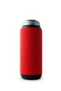 Portable bluetooth speaker standing isolated on white background. Red colored cylindrical shape Royalty Free Stock Photo