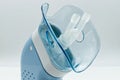 Portable compressor nebulizer with inhaler tool. Close-up. Medical equipment for inhalation therapy.