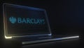 Portable computer with the logo of BARCLAYS made with code strings, editorial conceptual 3d rendering