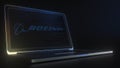 Portable computer with the logo of BOEING made with code strings, editorial conceptual 3d rendering