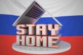 Portable computer and STAY HOME inscription with flag of Russia as a background. Russian Coronavirus self-isolation, 3D