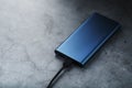 Portable External Battery Power Bank blue with USB Cord Royalty Free Stock Photo