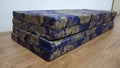 portable folding mattress with dark blue batik pattern