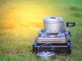 Pot stands on a portable gas stove. cooking on camping concept. Royalty Free Stock Photo