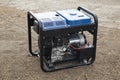 Portable gasoline generator.The use of an autonomous energy source. An additional source of energy Royalty Free Stock Photo