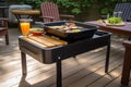 portable grill with attached side table for easy grilling and serving