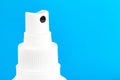 Portable hand sanitizer spray bottle top macro, closeup. Pocket hygiene healthcare accessories. Cleaning, disinfecting hands