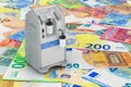 Portable Oxygen Concentrator on the euro background, 3D rendering