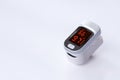 Portable pulse oximeter device on white background