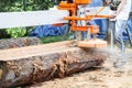 Portable Sawmill Sawing a Log