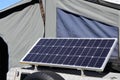 Portable solar panel in outdoor campsite