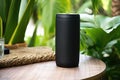 portable speaker in an out-of-office setting, with a focus on the greenery behind