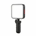 Portable Square LED Video Light with Black Handle and Red Buttons on a White Background Royalty Free Stock Photo