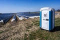 Portable toilet at an asparagus field