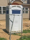 Portable toilet at construction site