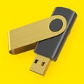 Portable USB flash drive stick for workspace isolated on yellow background Royalty Free Stock Photo