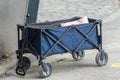 Portable utilitarian folding cart, crib on wheels, travel sleeper.