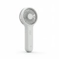 Portable White Mini Electric Fan with Plastic Casing on White Background Royalty Free Stock Photo