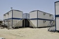 Portacabin house for laboursPortable house and office cabins. Labour Camp. Porta cabin. small temporary houses Royalty Free Stock Photo