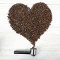 Portafilter handle and heart shaped rammer with arabica seeds
