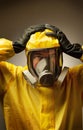 Man wearing a hazmat suit and mask