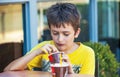 Portait happy boy at ice cream cafe Royalty Free Stock Photo