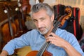portait man playing cello Royalty Free Stock Photo