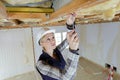 portait woman working with wood