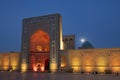 Portal of the ancient Kalyan mosque (Poi-Kalyan) in colorful night illumination, Bukhara