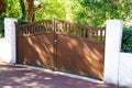 Portal brown door metal aluminum house gate street view