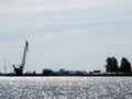 Portal crane on the wharf on Lake Onega