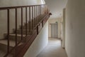 Portal of a house with stairs with brown metal railing Royalty Free Stock Photo