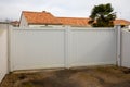 portal steel beige double high large white metal gate fence on modern house street