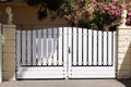 Portal white plastic pvc house gate in street view