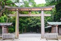 Portal of wood gate temple, Torii of Meiji Jingu Shrine in Central Tokyo Shibuya, Japan. Meiji Jingu Shrin is the Shinto shrine