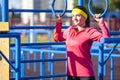 Portrait of Positive Caucasian Sportswoman in Summer Outdoor Outfit