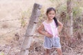 Portarit Thai little girl with barbed fence Royalty Free Stock Photo