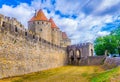 Porte Narbonnaise leading to the old town of Carcassonne, France