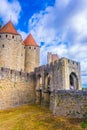 Porte Narbonnaise leading to the old town of Carcassonne, France